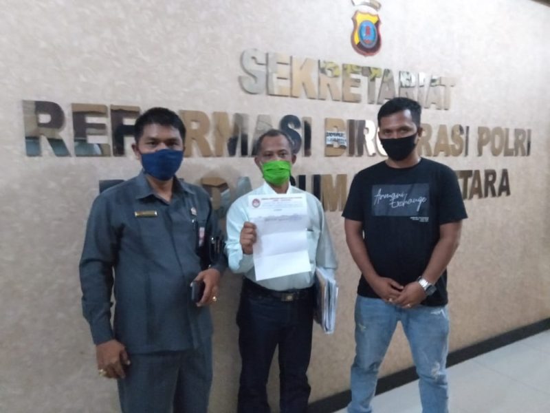 Ket foro : Parlaungan Silalahi,SH dan Januar Effendy Siregar saat mendatangi Polda Sumut membuat Laporan Pengaduan