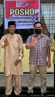 Kades Sipungguk bersama Kasat Narkoba Polres Kampar
